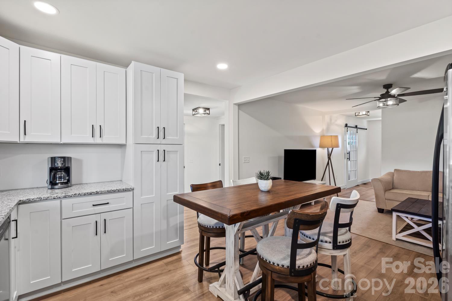 5740 Crouse Road Crouse, NC 28033 - Photo 7 of 28 a view of a dining room with furniture and wooden floor