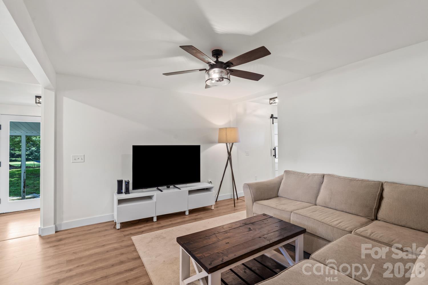 5740 Crouse Road Crouse, NC 28033 - Photo 10 of 28 a living room with furniture and a flat screen tv