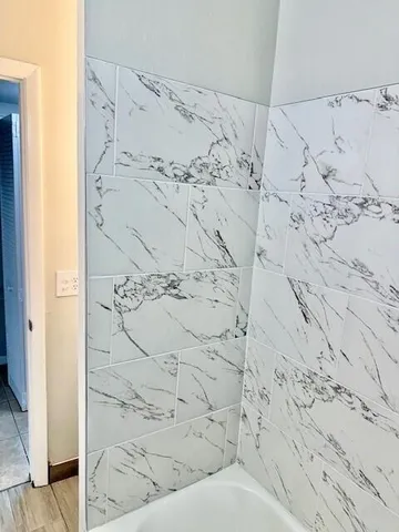 a bathroom with a bathtub