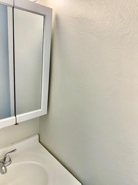 650 Southwest 2nd Avenue, Unit 253 Boca Raton, FL 33432 - Photo 19 of 32 a bathroom with a bathtub