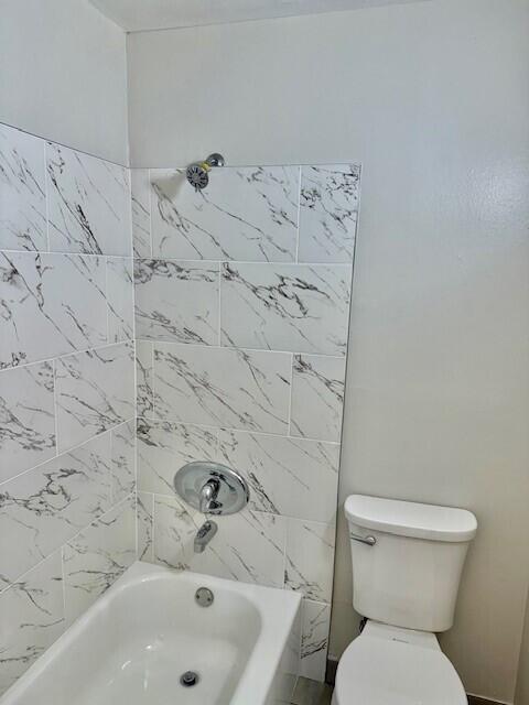 650 Southwest 2nd Avenue, Unit 253 Boca Raton, FL 33432 - Photo 22 of 32 a bathroom with a toilet and a sink