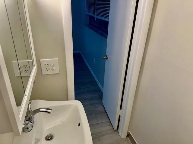 a bathroom with a sink and a toilet