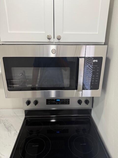 650 Southwest 2nd Avenue, Unit 253 Boca Raton, FL 33432 - Photo 8 of 32 a view of washer and dryer