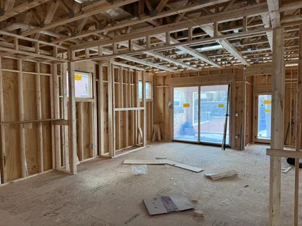 a view of a room with wooden walls