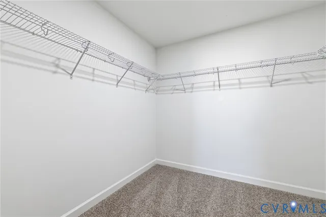 a bathroom with a toilet sink and shower