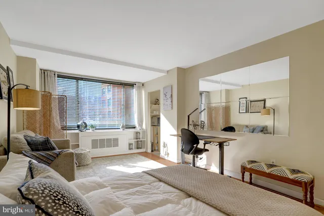 a room with furniture and a window