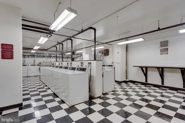 a view of a storage & utility room with a sink