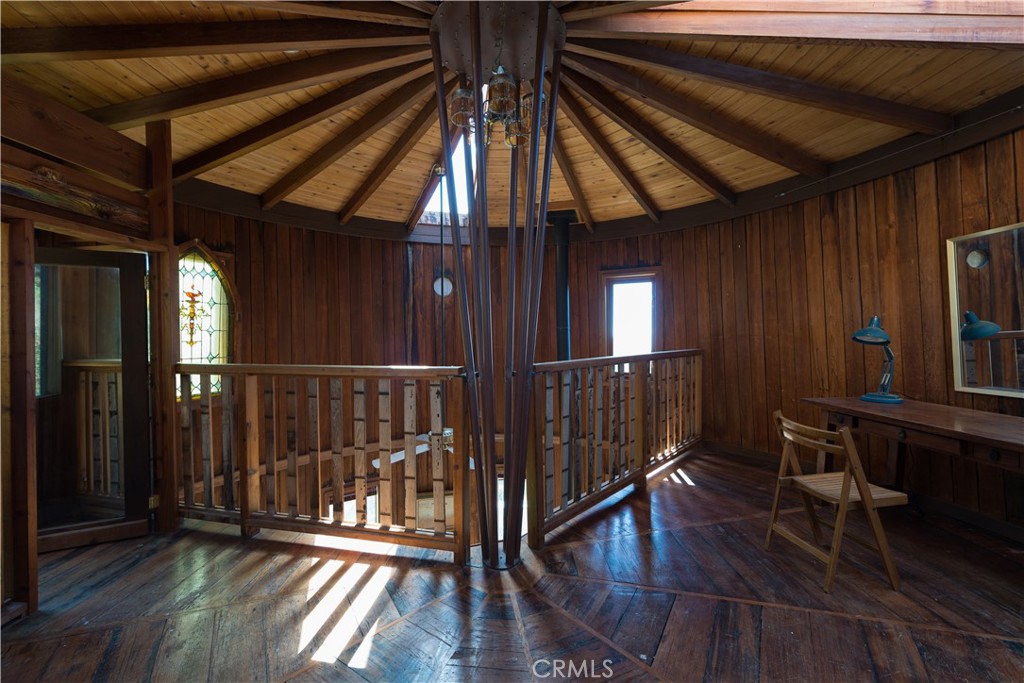 0 Pias Ranch Road Big Sur, CA 93920 - Photo 19 of 34 a view of staircase with wooden floor and fence