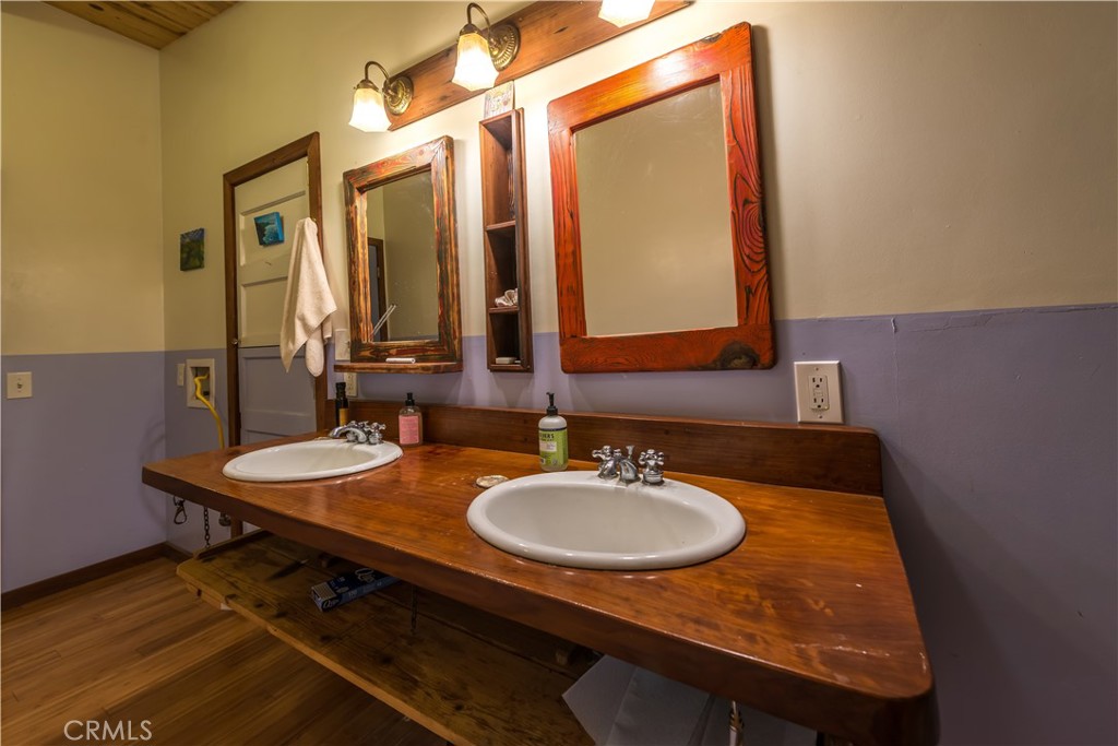 0 Pias Ranch Road Big Sur, CA 93920 - Photo 21 of 34 a bathroom with a sink a mirror and a toilet