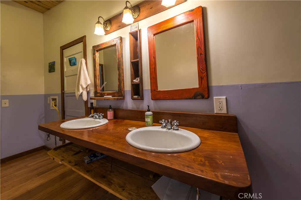 0 Pias Ranch Road Big Sur, CA 93920 - Photo 21 of 34 a bathroom with a sink a mirror and a toilet