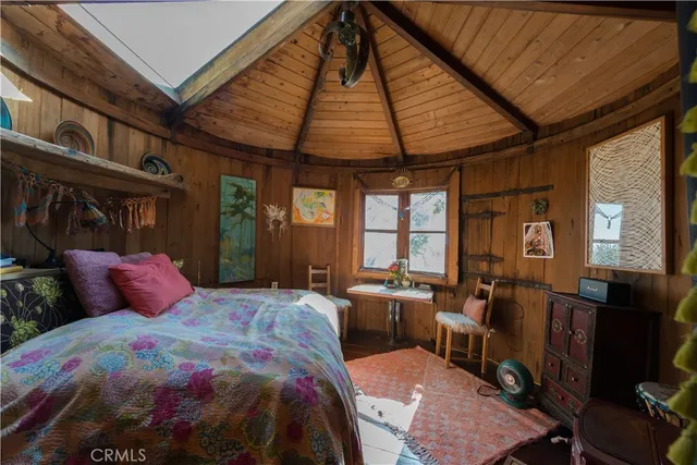 a view of wooden floor with windows