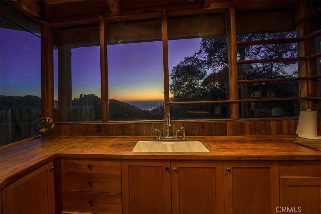 0 Pias Ranch Road Big Sur, CA 93920 - Photo 9 of 34 a bathroom with a sink and a mirror