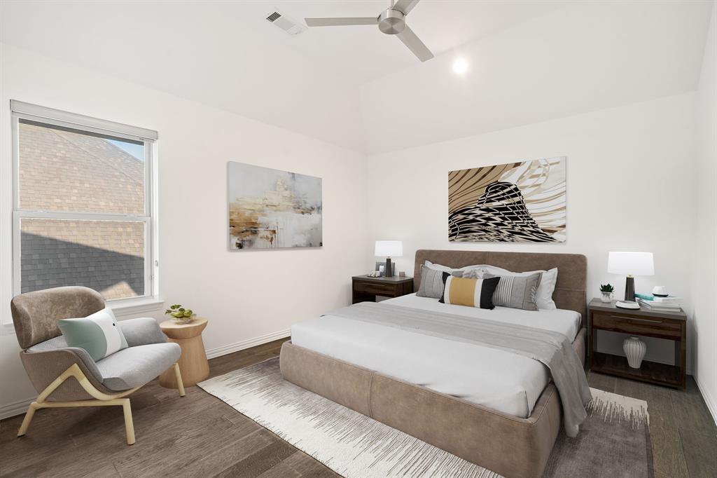 2441 Flat Creek Road Frisco, TX 75036 - Photo 27 of 34 a bedroom with a bed and a couch