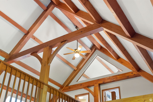 435 Canyon Road Millville, UT 84326 - Photo 12 of 113 Vaulted ceiling featuring exposed wood beams and white panels