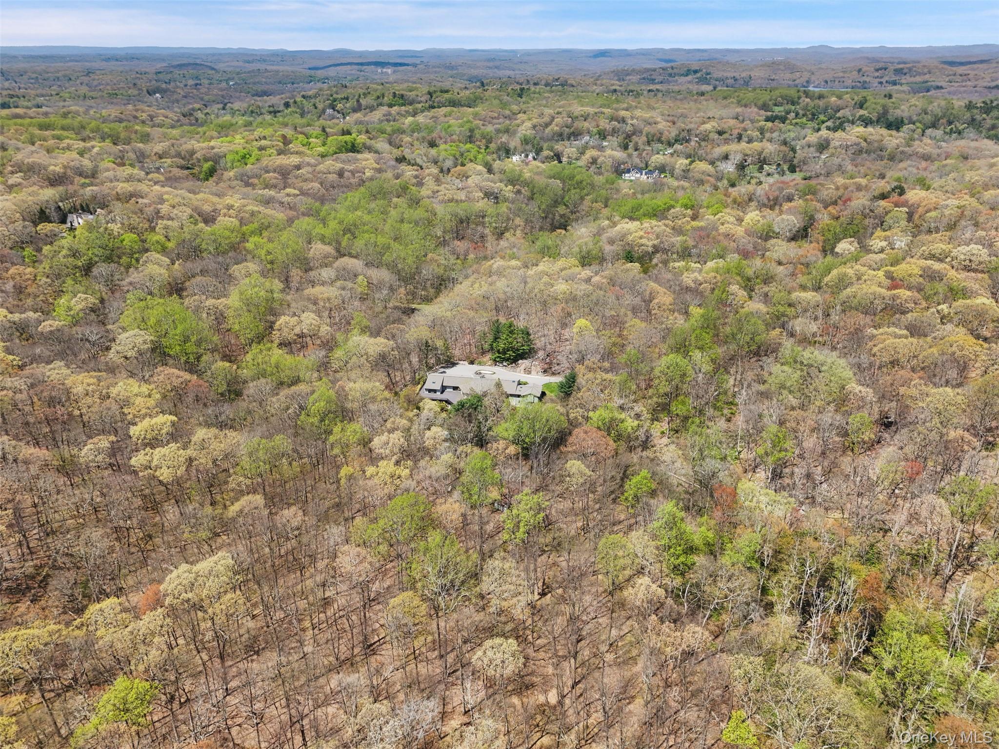 68 Old Aspetong Road Katonah, NY 10536 - Photo 2 of 13 a view of a field with a mountain in the background