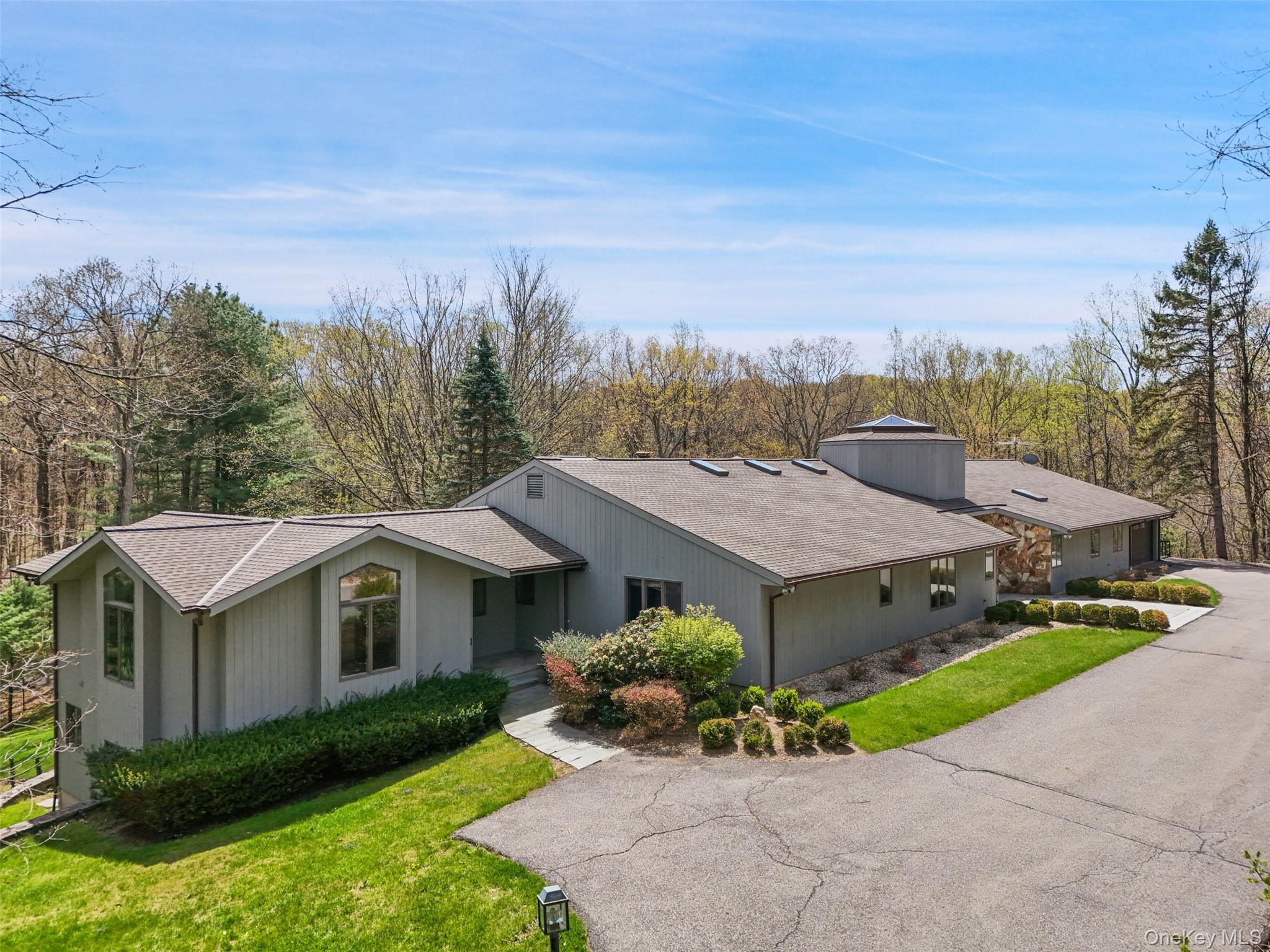 68 Old Aspetong Road Katonah, NY 10536 - Photo 6 of 13 a aerial view of a house with a yard and large tree