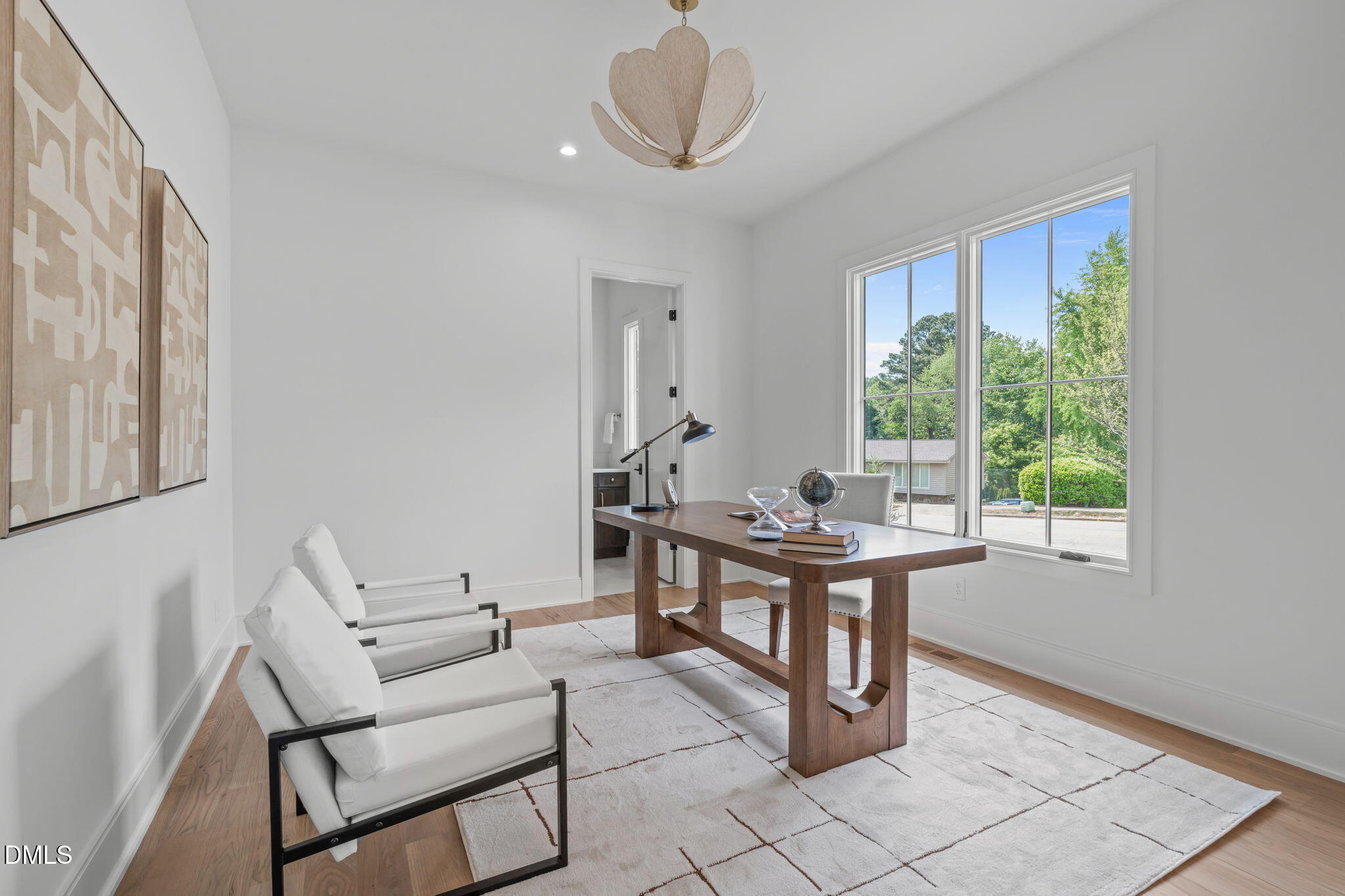 7917 South Bridgewater Court Raleigh, NC 27615 - Photo 33 of 67 a view of a workspace with furniture and a window