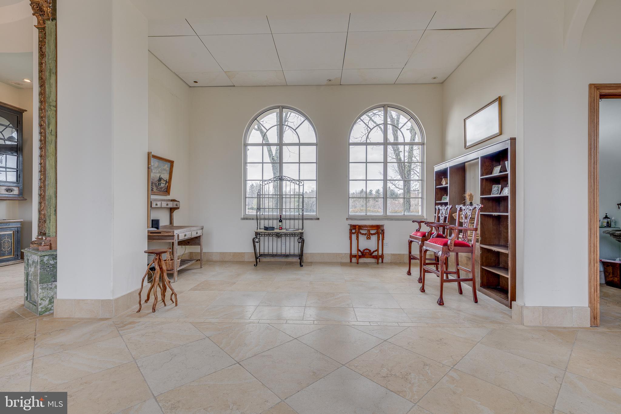 139 Bordentown Georgetown Road Chesterfield, NJ 08515 - Photo 13 of 89 a view of a livingroom with chairs and a large window
