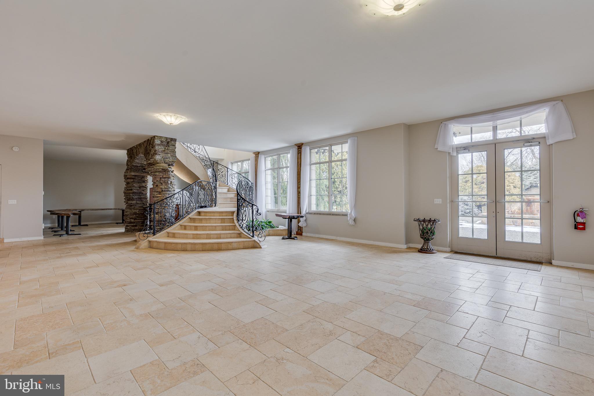 139 Bordentown Georgetown Road Chesterfield, NJ 08515 - Photo 43 of 89 a view of an empty room with a fireplace and a large window