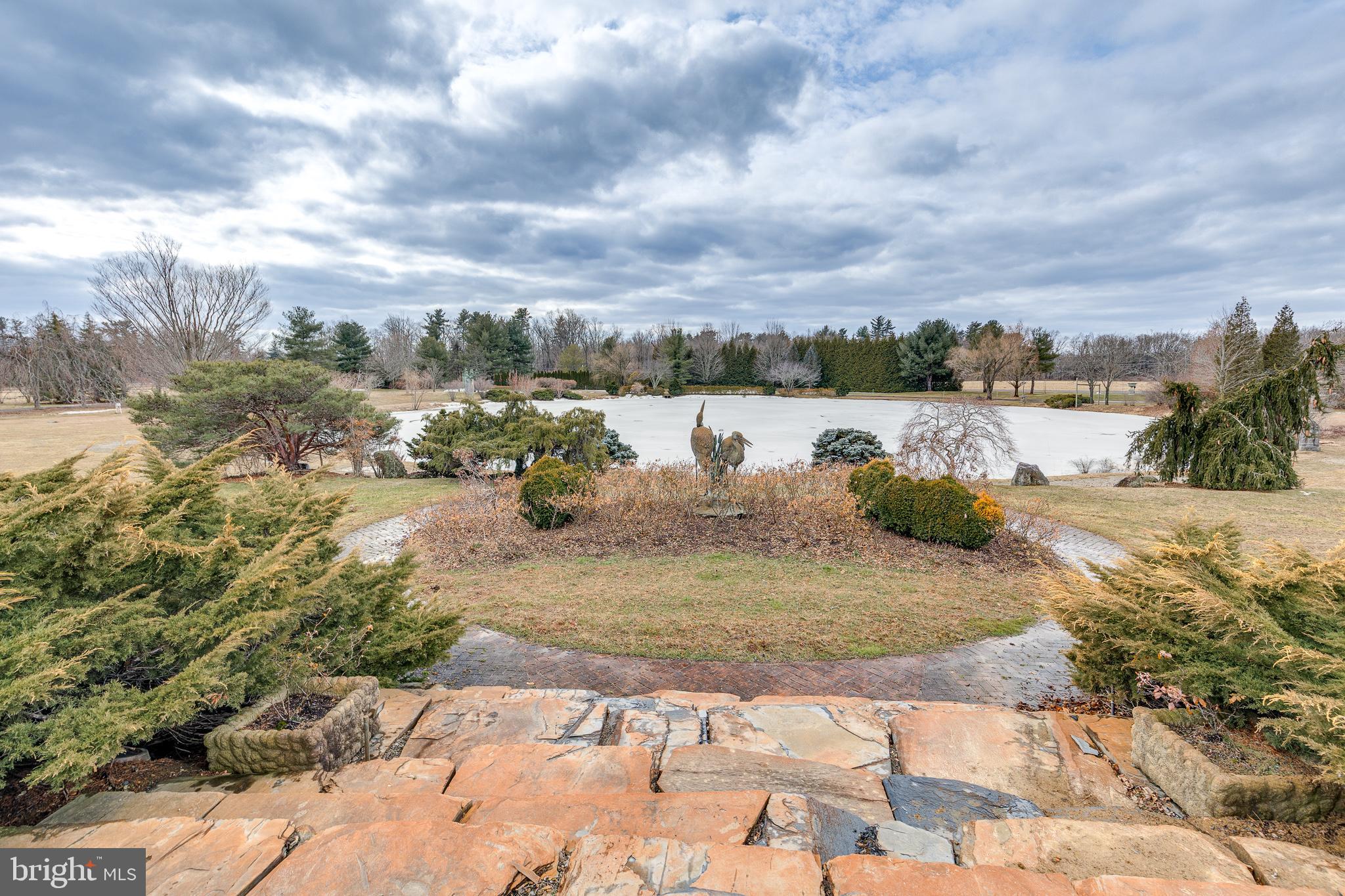 139 Bordentown Georgetown Road Chesterfield, NJ 08515 - Photo 5 of 89 a view of a lake with houses in the back