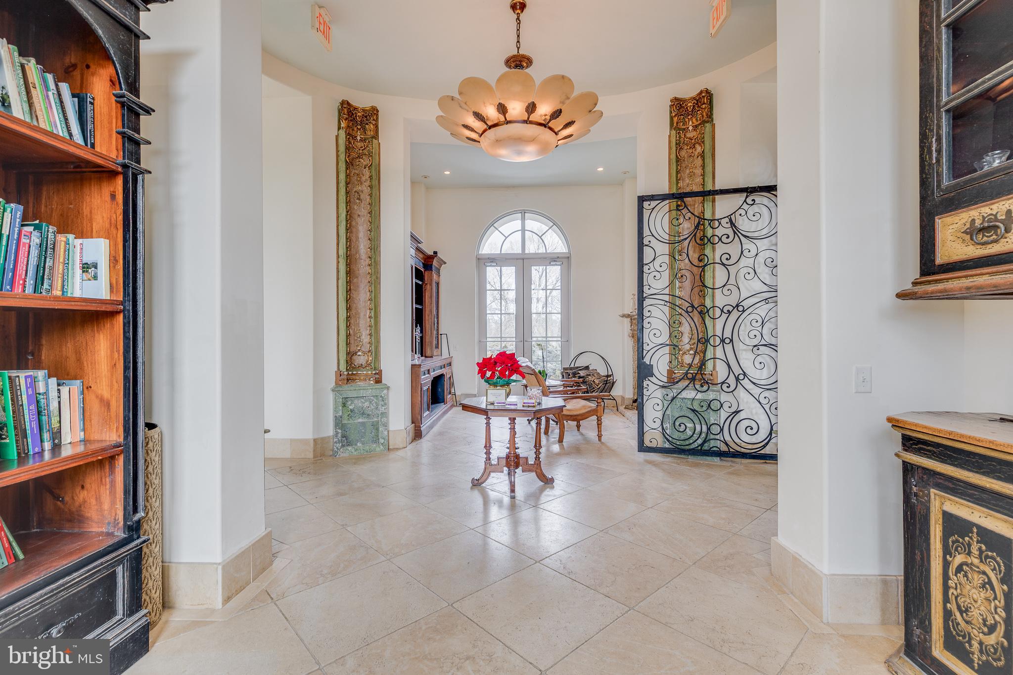 139 Bordentown Georgetown Road Chesterfield, NJ 08515 - Photo 6 of 89 a living room with fireplace furniture and a book shelf