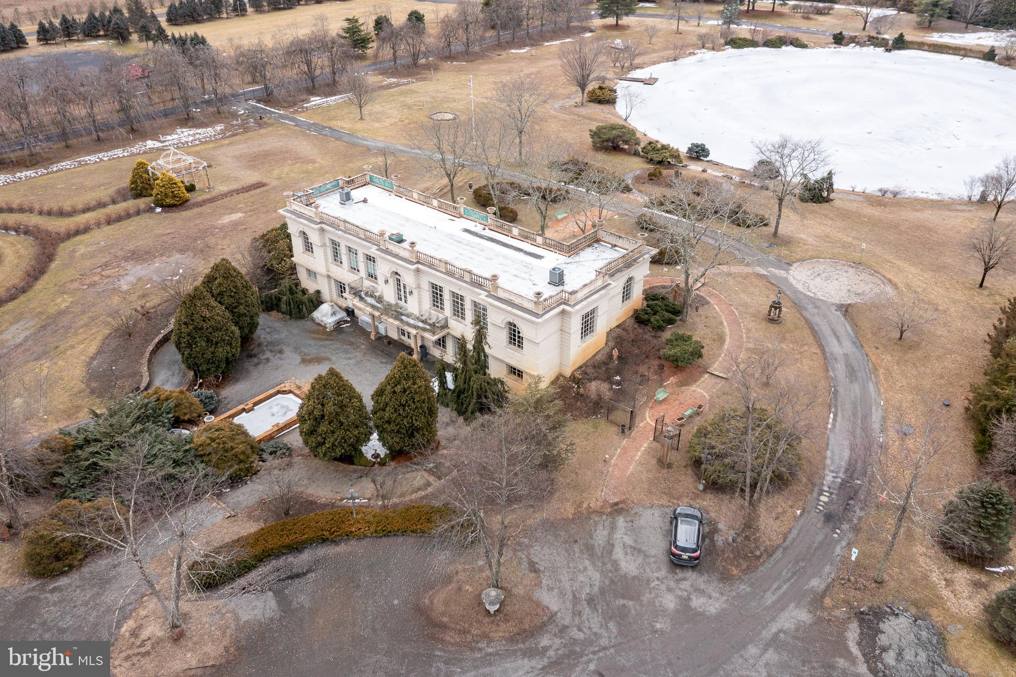 139 Bordentown Georgetown Road Chesterfield, NJ 08515 - Photo 62 of 89 an aerial view of a house with a yard and lake view