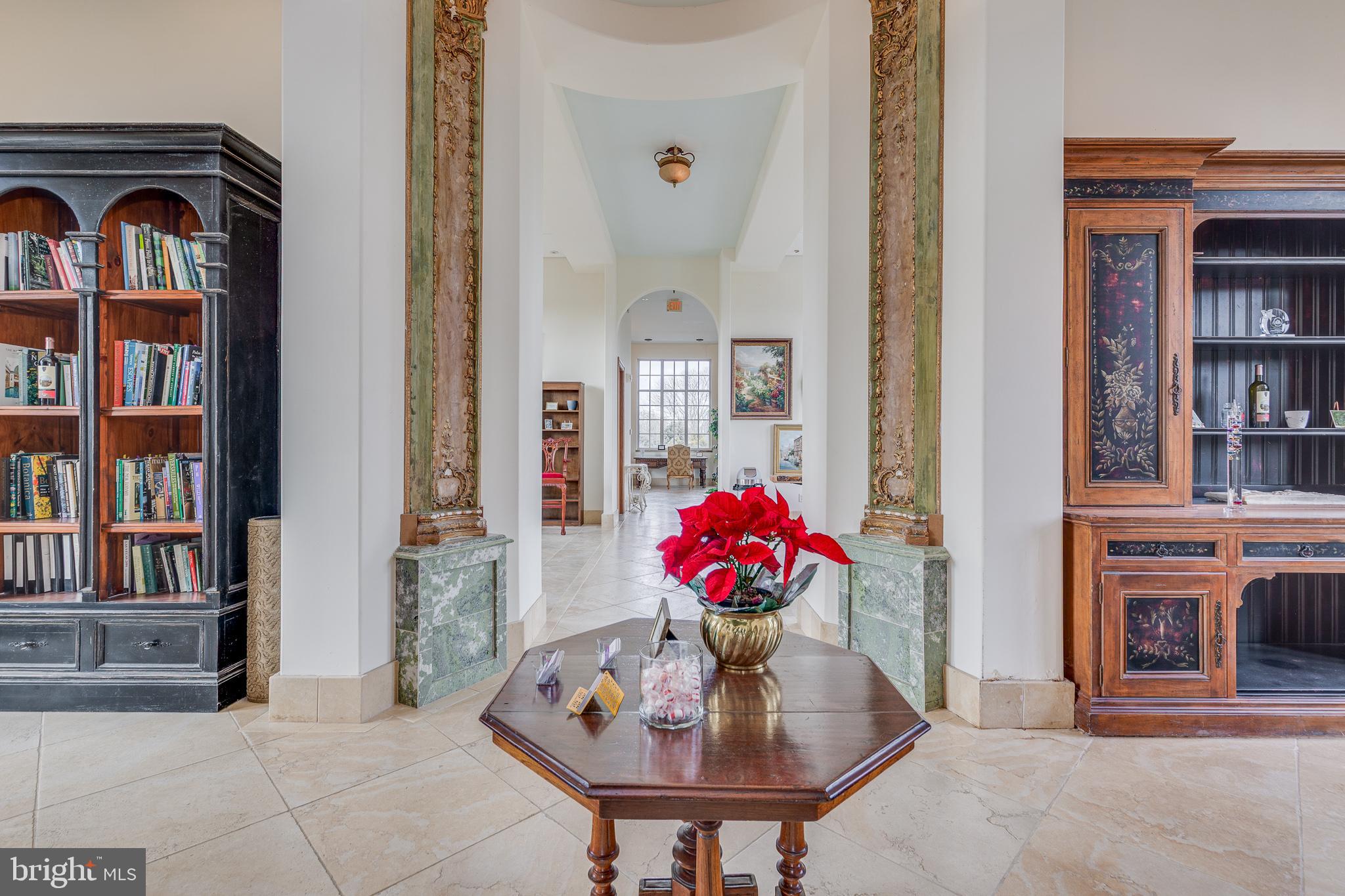139 Bordentown Georgetown Road Chesterfield, NJ 08515 - Photo 10 of 89 a view of living room filled with furniture and book shelf