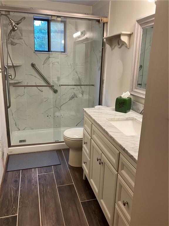 125 Beacon Road Renfrew, PA 16053 - Photo 17 of 31 a bathroom with a sink a toilet and shower