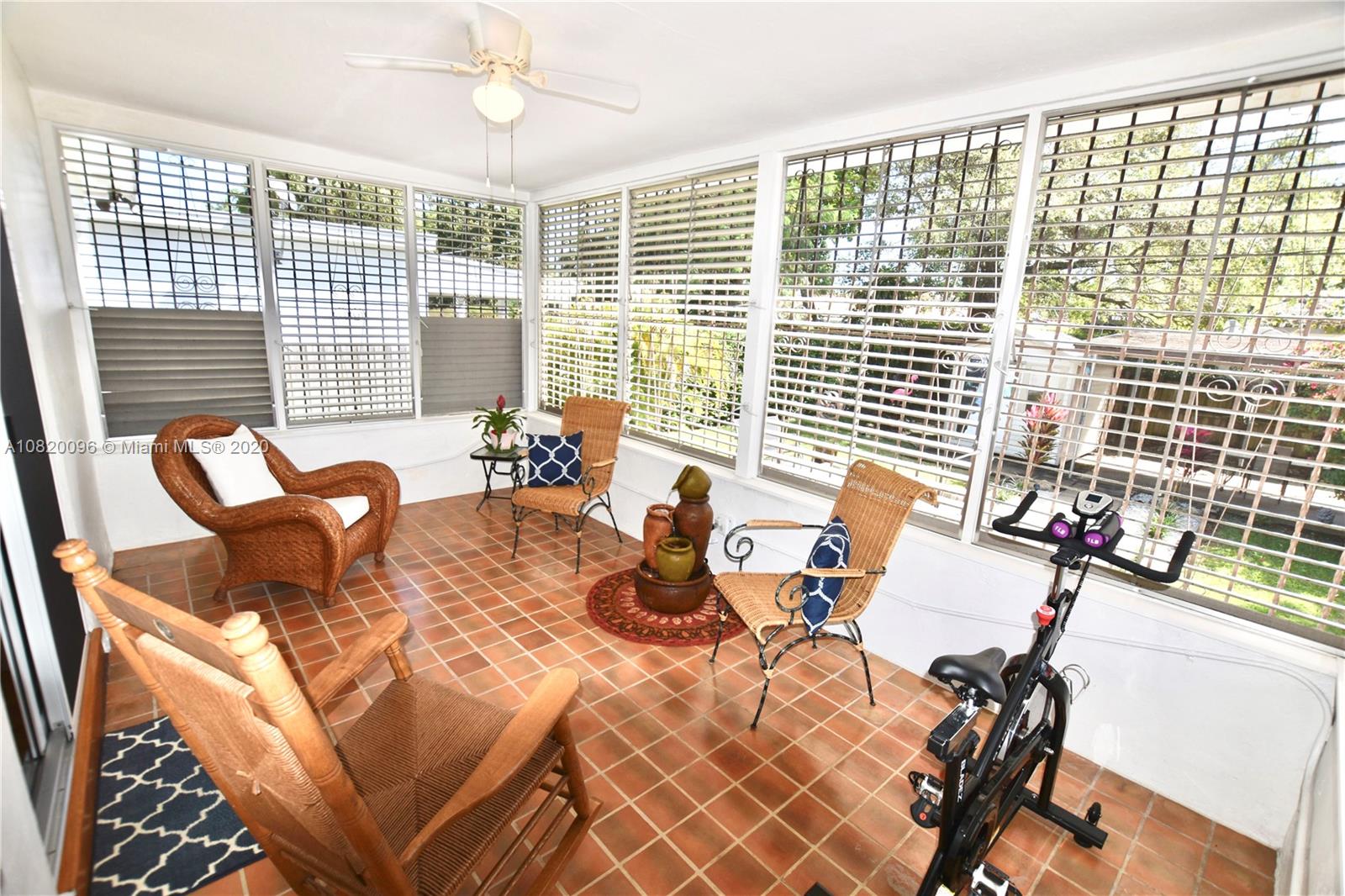 2270 Southwest 24th Street Miami, FL 33145 - Photo 13 of 22 a view of a dining room and livingroom with furniture