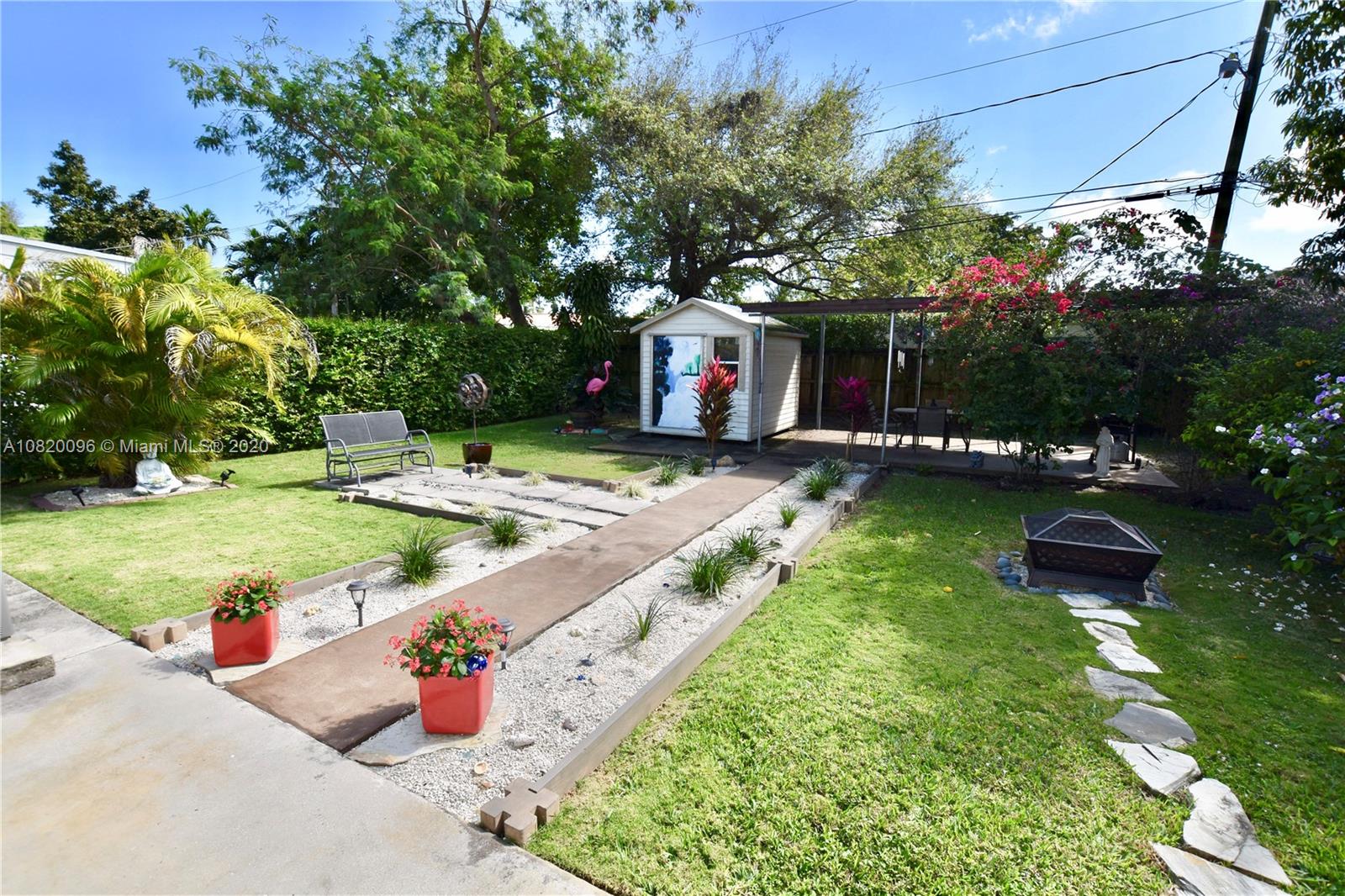 2270 Southwest 24th Street Miami, FL 33145 - Photo 19 of 22 a view of a house with pool yard and a sitting area