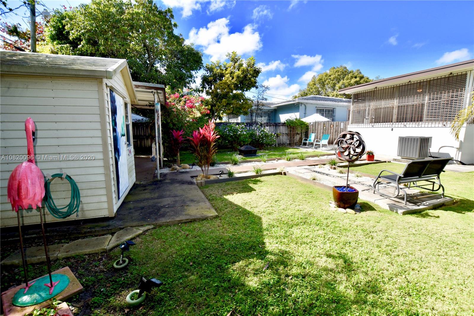 2270 Southwest 24th Street Miami, FL 33145 - Photo 21 of 22 a view of a fountain in front of house