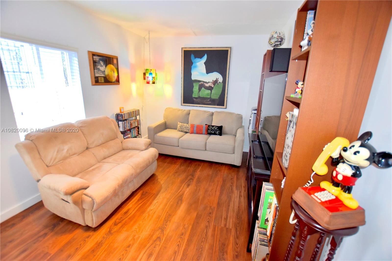 2270 Southwest 24th Street Miami, FL 33145 - Photo 9 of 22 a living room with furniture and a couch