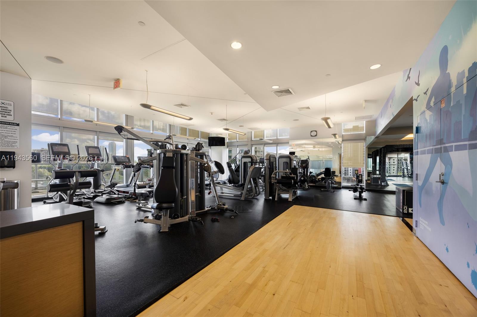 79 Southwest 12th Street, Unit PH3904S Miami, FL 33130 - Photo 17 of 33 a gym room with lots of gym equipment