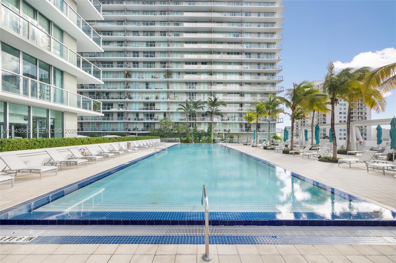 79 Southwest 12th Street, Unit PH3904S Miami, FL 33130 - Photo 21 of 33 a view of swimming pool with outdoor seating
