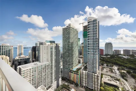 a view of a city with tall buildings