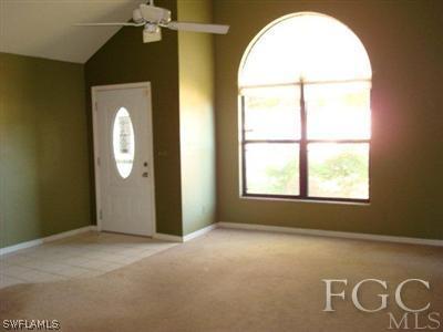 17536 Lebanon Road Fort Myers, FL 33967 - Photo 6 of 10 an empty room with windows