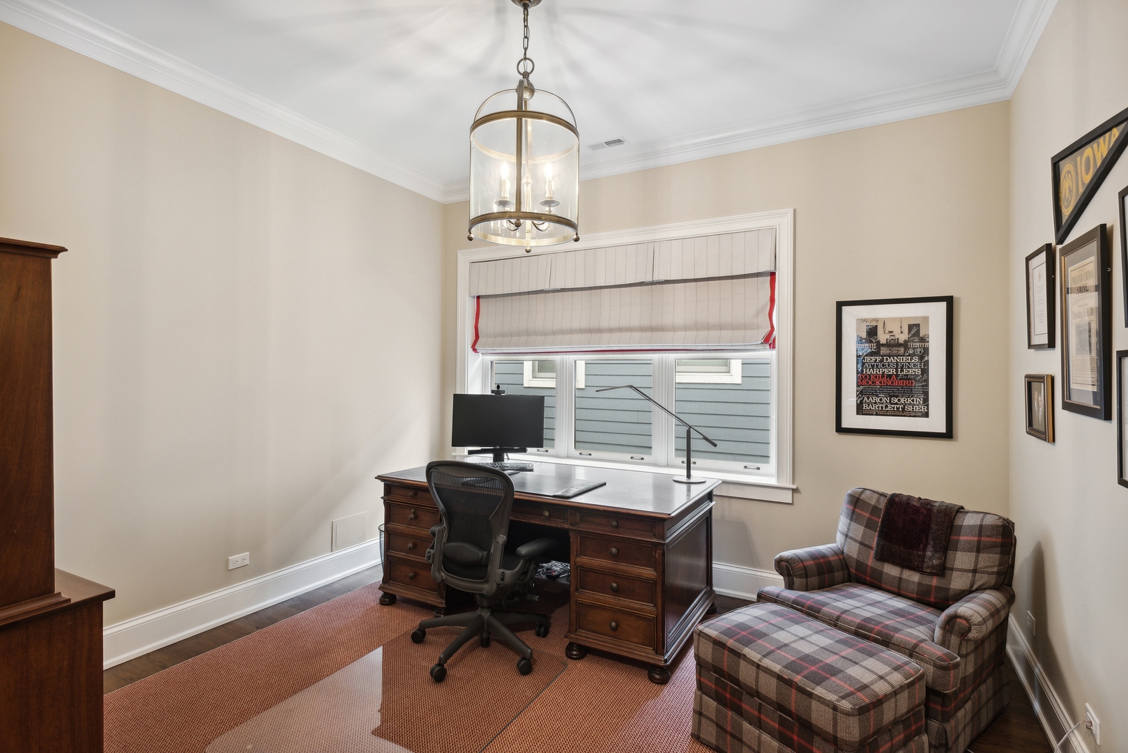 2148 West Giddings Street Chicago, IL 60625 - Photo 22 of 51 a workspace with a desk chair and painted walls