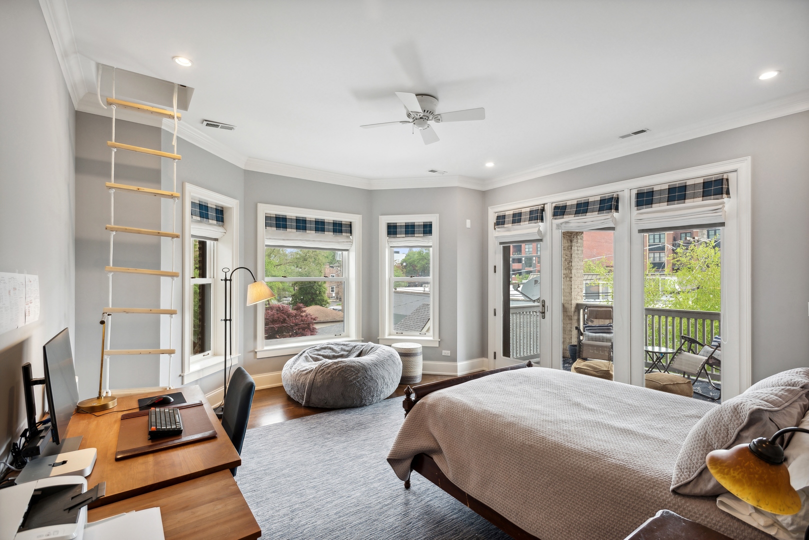 2148 West Giddings Street Chicago, IL 60625 - Photo 24 of 51 a bedroom with bed couch and window
