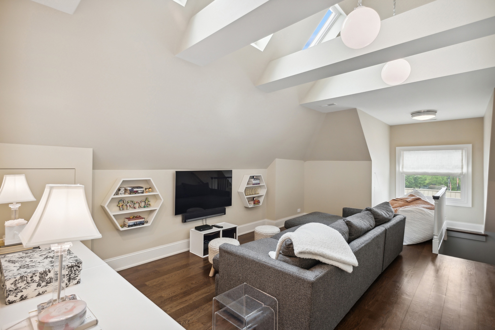 2148 West Giddings Street Chicago, IL 60625 - Photo 29 of 51 a living room with furniture and a flat screen tv