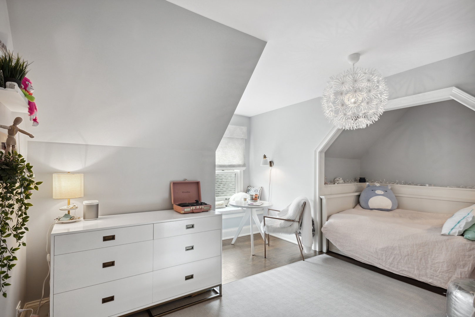 2148 West Giddings Street Chicago, IL 60625 - Photo 32 of 51 a bedroom with a bed and chandelier