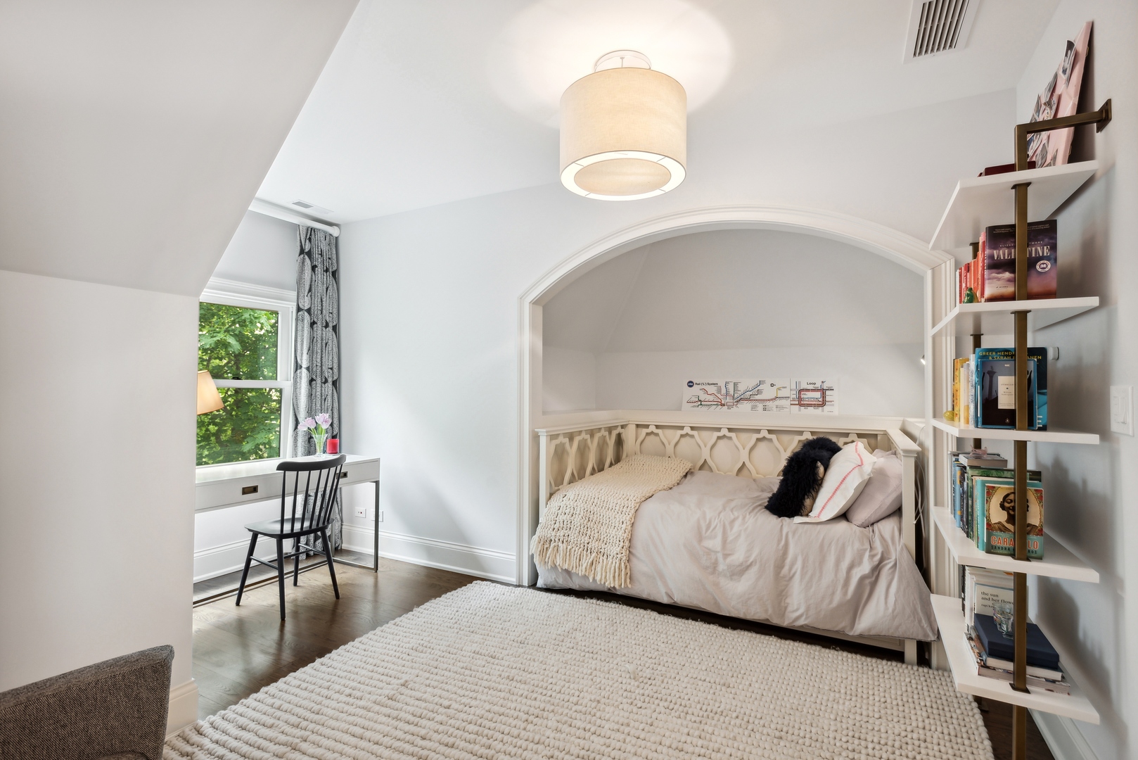 2148 West Giddings Street Chicago, IL 60625 - Photo 37 of 51 a bedroom with a bed and a large window