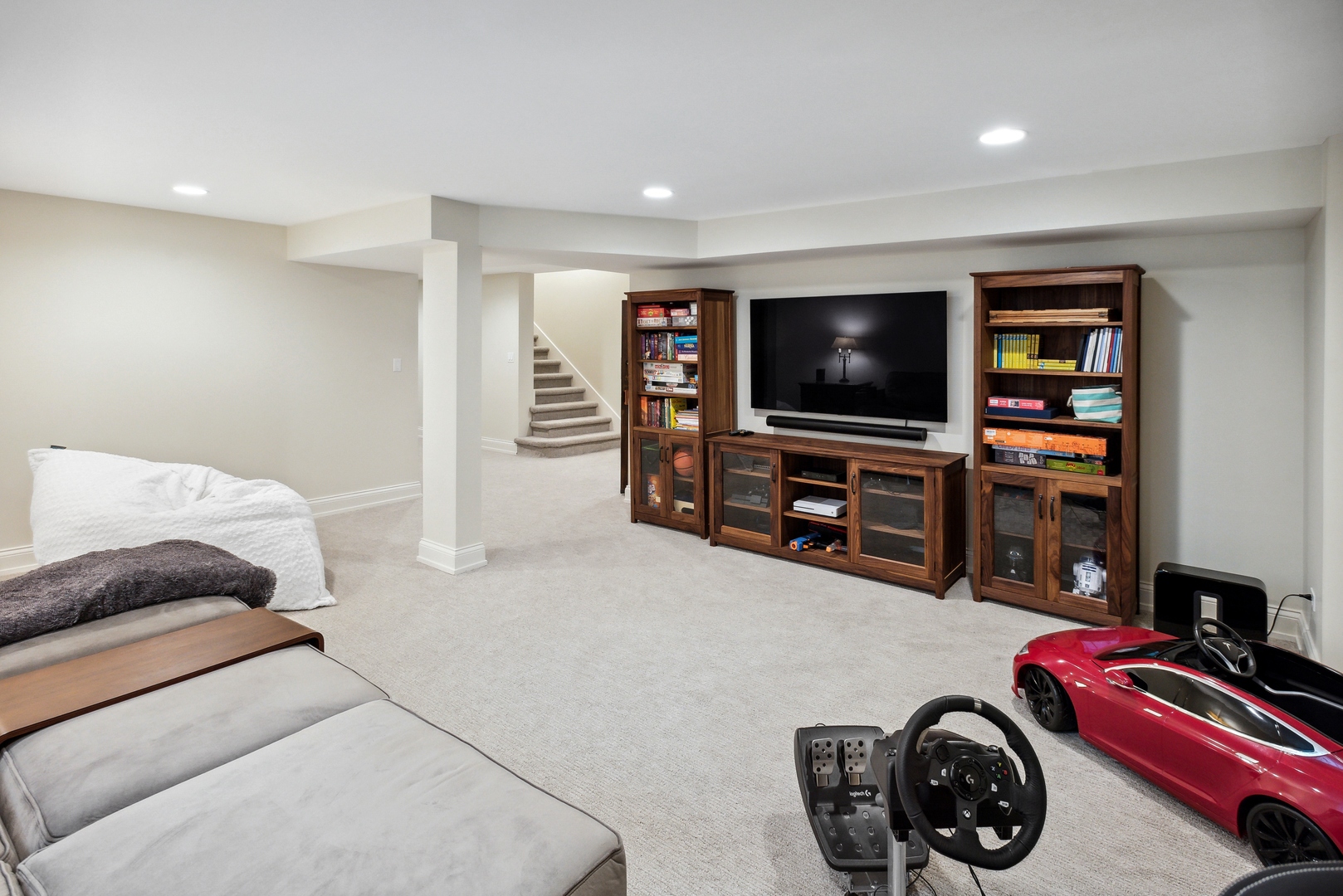 2148 West Giddings Street Chicago, IL 60625 - Photo 41 of 51 a bedroom with furniture and a flat screen tv