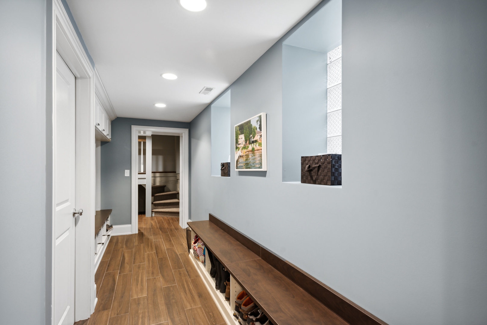 2148 West Giddings Street Chicago, IL 60625 - Photo 46 of 51 wooden floor in an empty room with a window