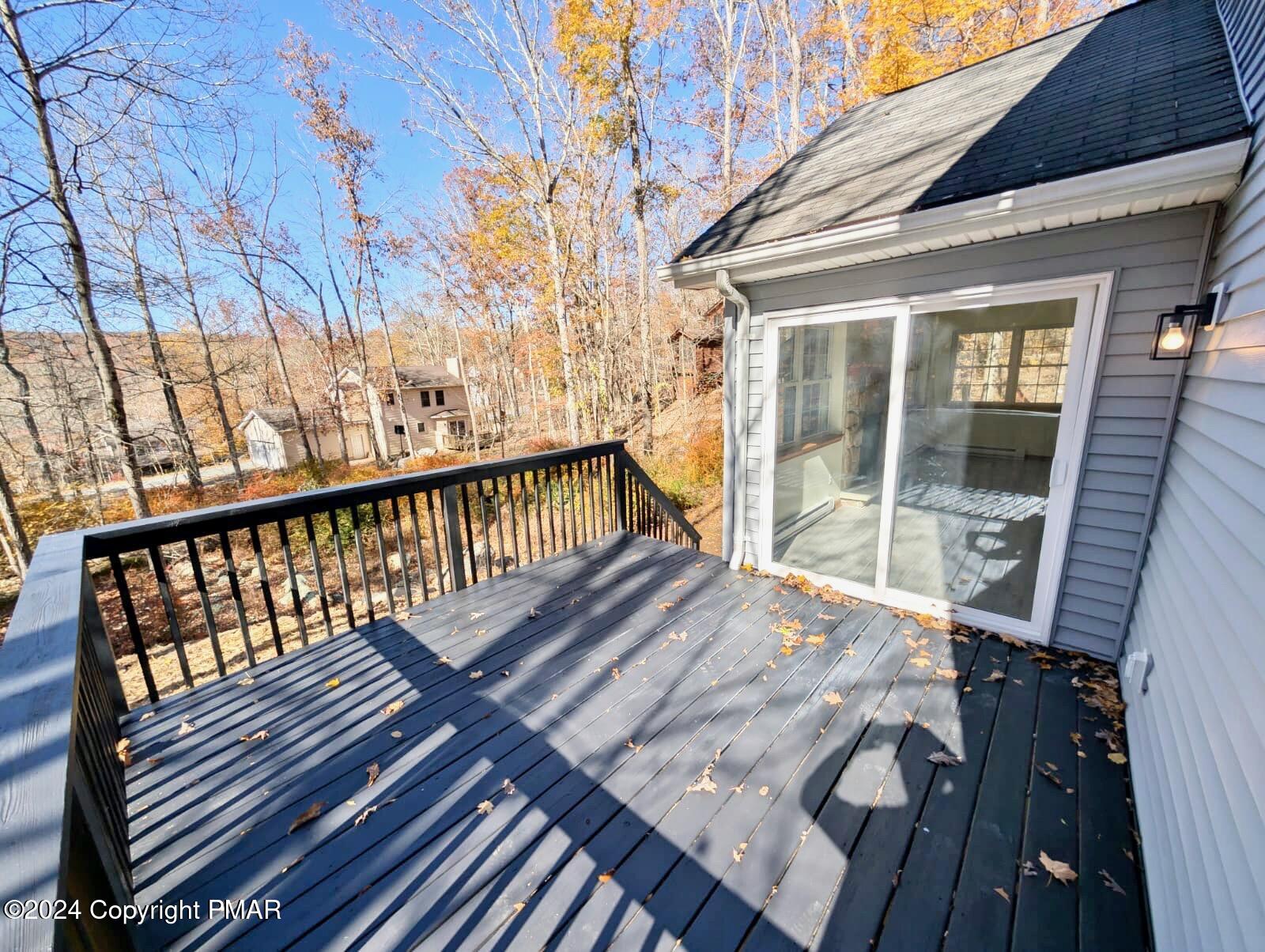 143 Cornwall Place Bushkill, PA 18324 - Photo 32 of 34 a view of balcony with wooden floor
