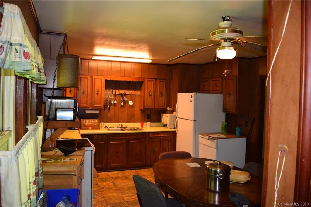924 Antrim Road Clover, SC 29710 - Photo 11 of 23 a view of a dining room with furniture and chandelier