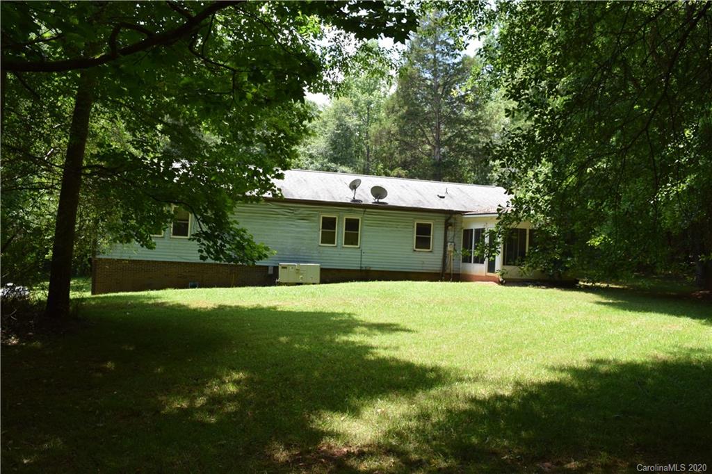 924 Antrim Road Clover, SC 29710 - Photo 5 of 23 a front view of a house with a yard garage and outdoor seating