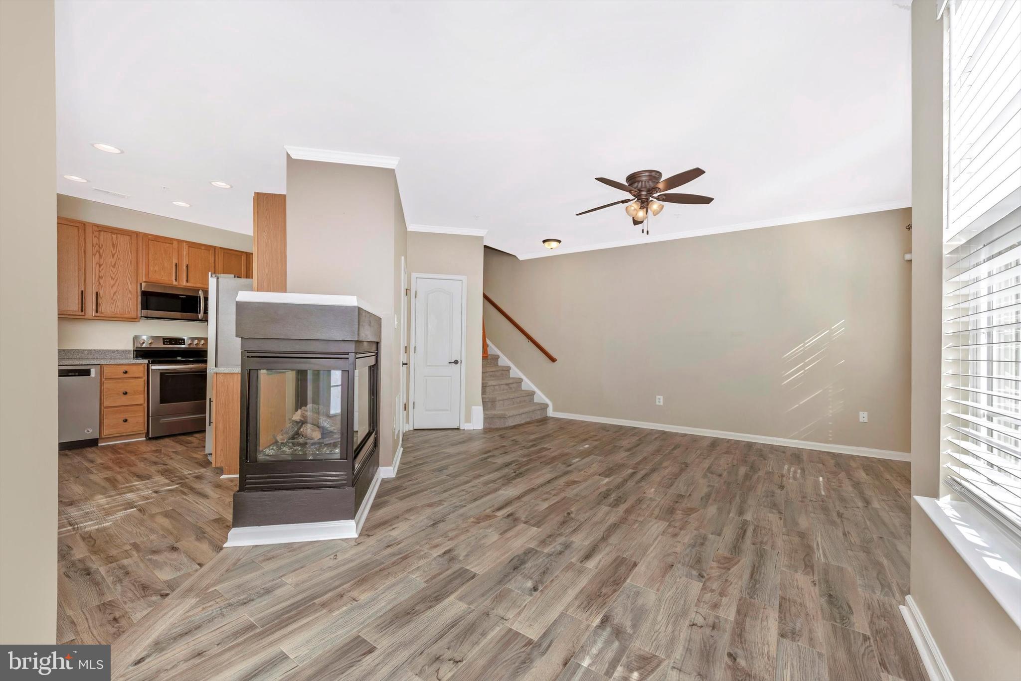 100 Quail's Nest Way Frederick, MD 21702 - Photo 6 of 40 3 Sided Fireplace can be seen from all areas