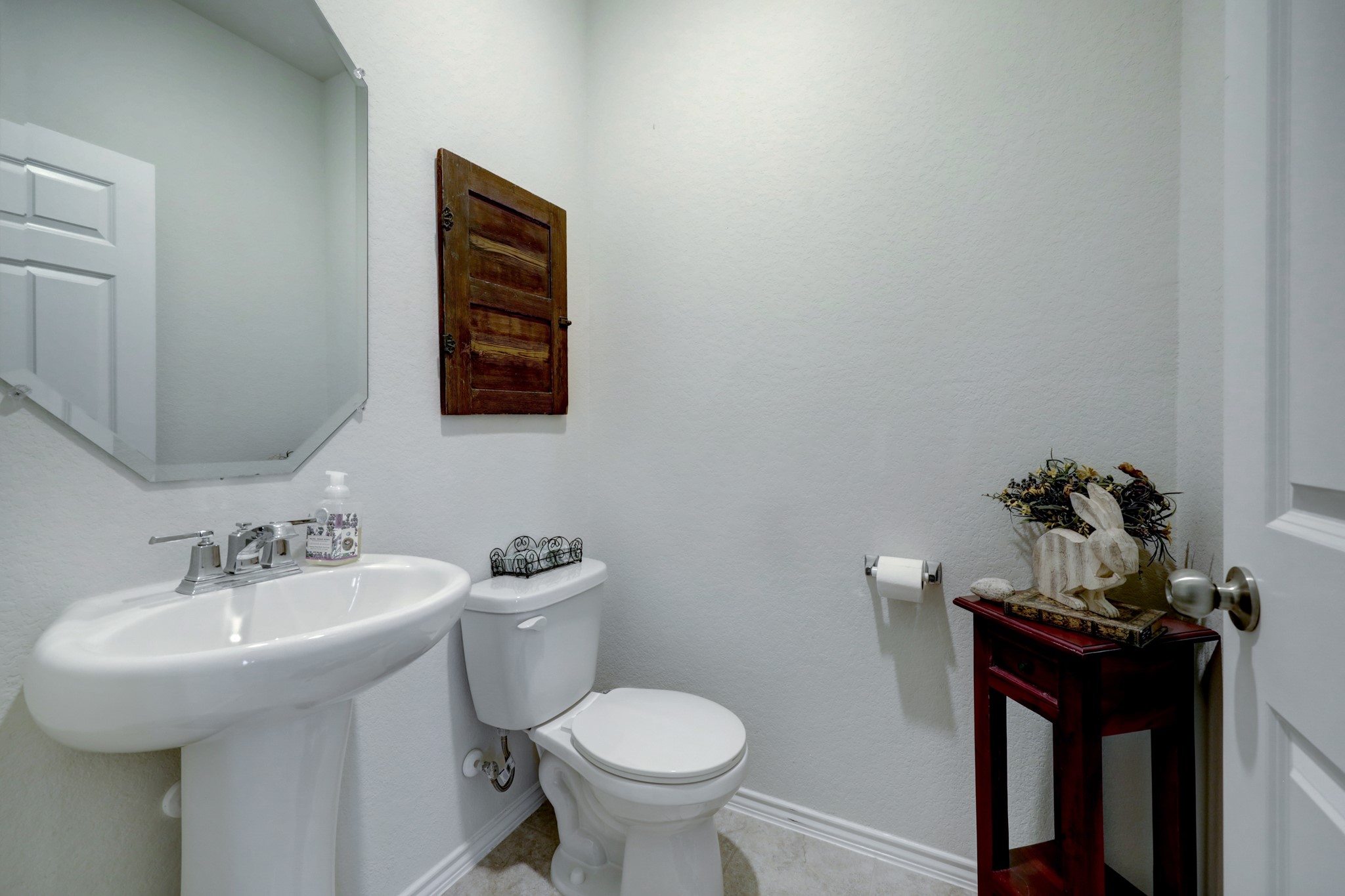 25735 Royal Catchfly Road Katy, TX 77493 - Photo 9 of 31 Half bath powder room on the first floor