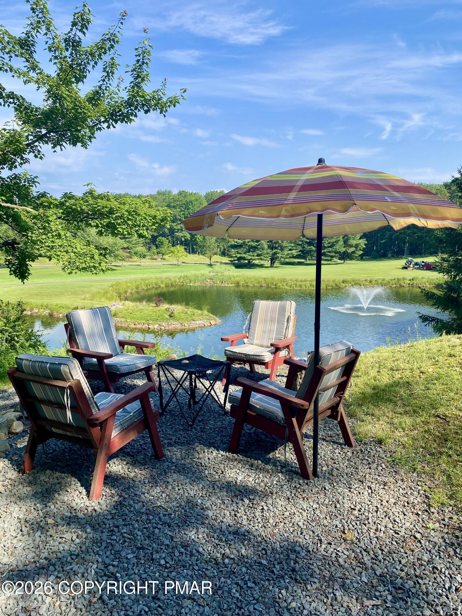 481 Moseywood Road Lake Harmony, PA 18624 - Photo 4 of 20 a backyard of a house with outdoor seating