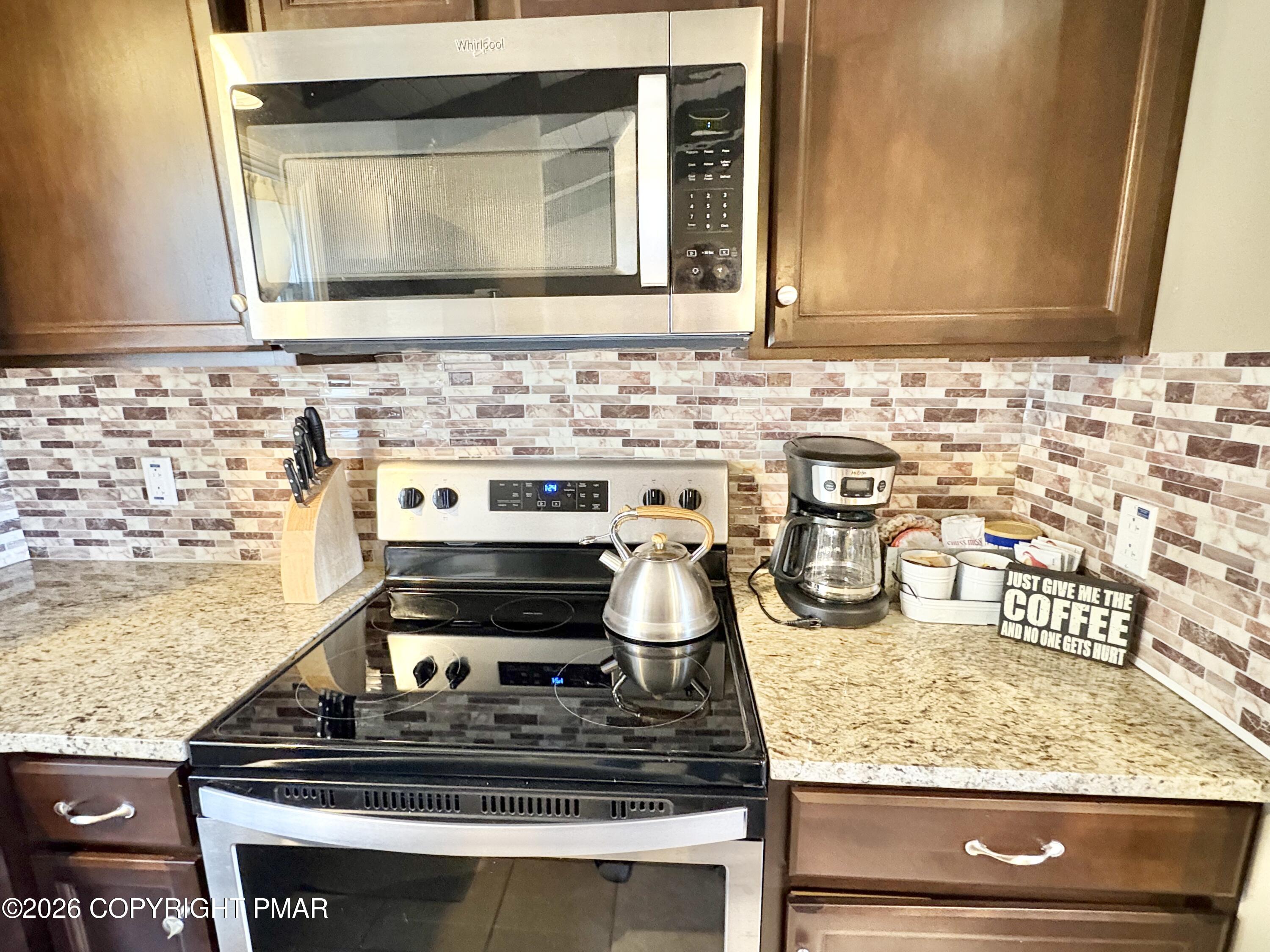 481 Moseywood Road Lake Harmony, PA 18624 - Photo 7 of 20 a stove top oven sitting inside of a kitchen